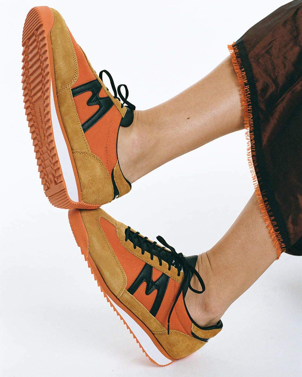 Mestari - Jaffa Orange / Black | Karhu on sale